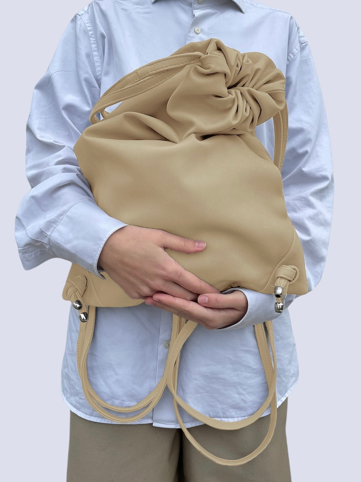 BEIGE LEATHER DRAW STRING BAG