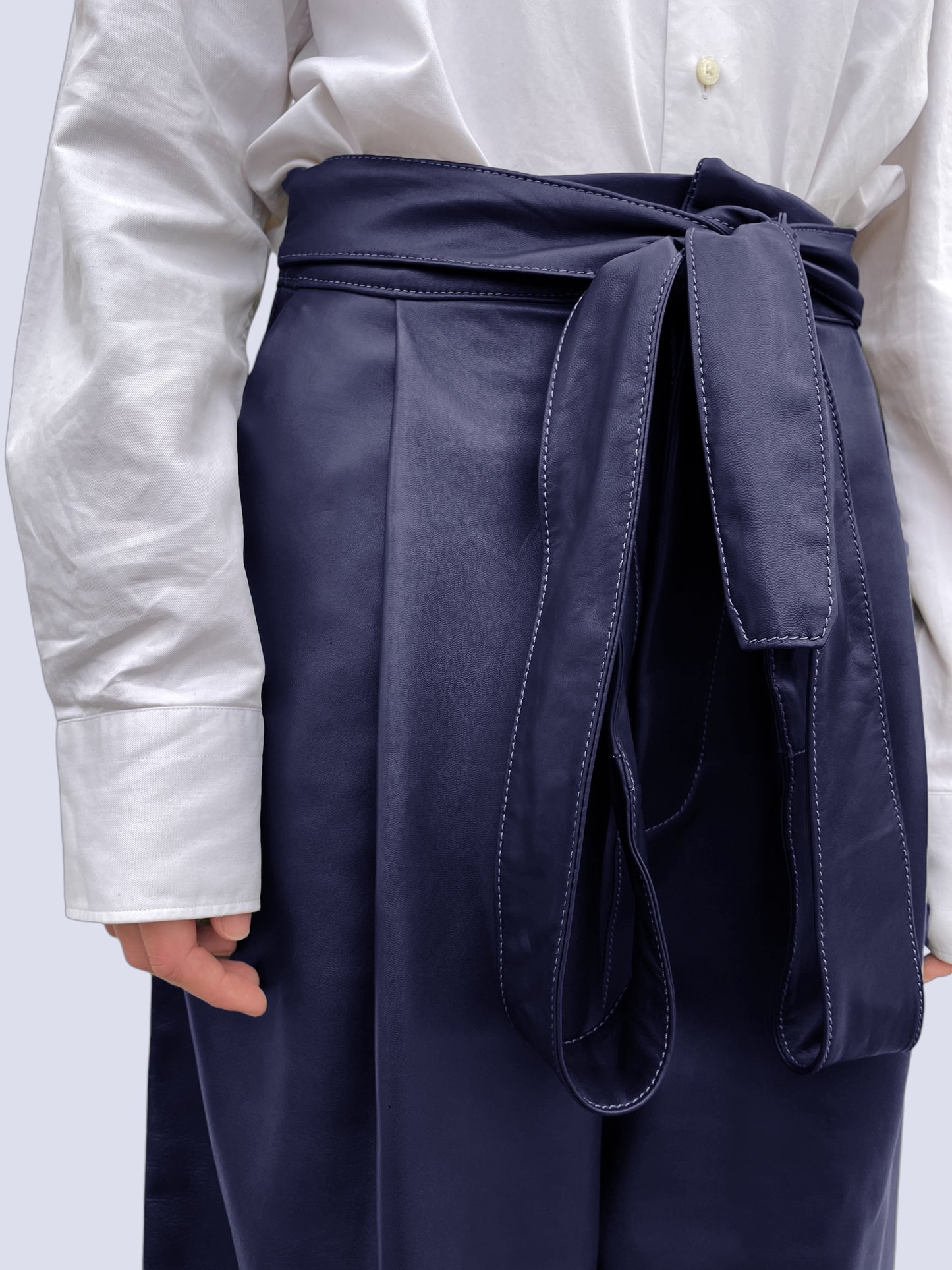 NAVY LEATHER BOW PANTS